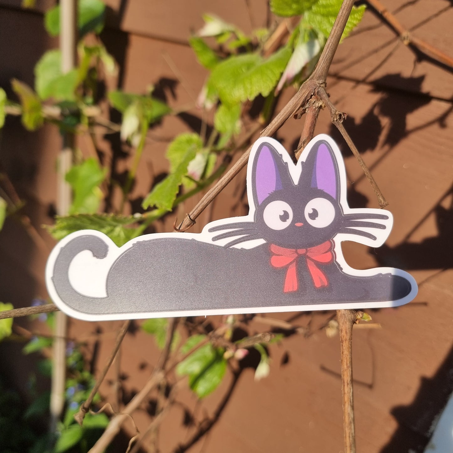 Jiji Laying Down Decal